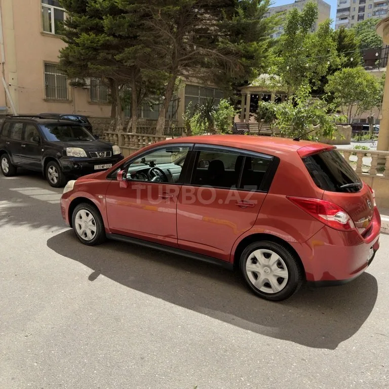 Nissan Tiida — фото 2/4