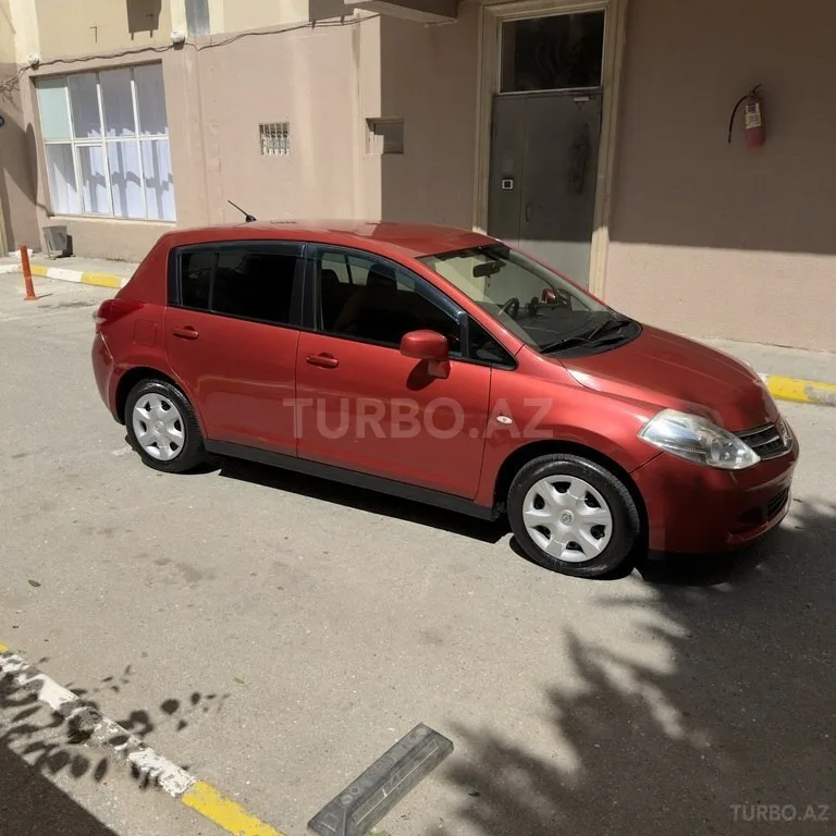 Nissan Tiida — фото 4/4
