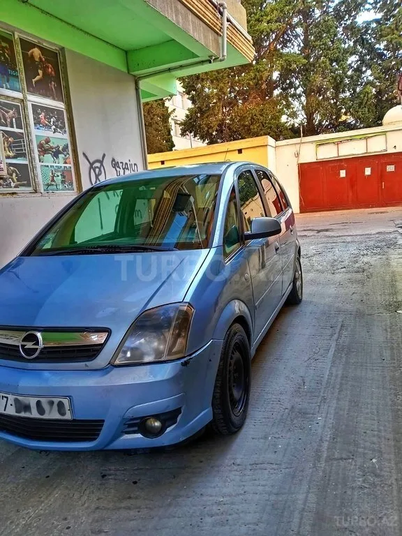 Opel Meriva — фото 3/4