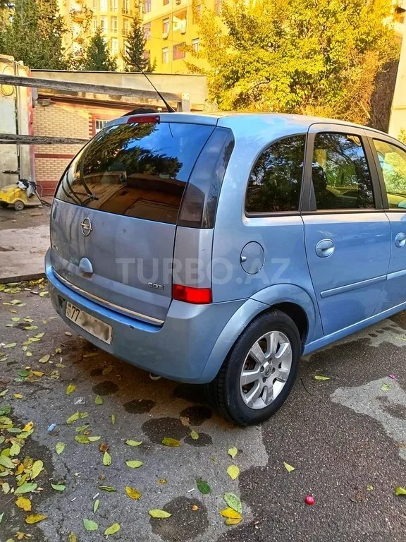 Opel Meriva — фото 4/4