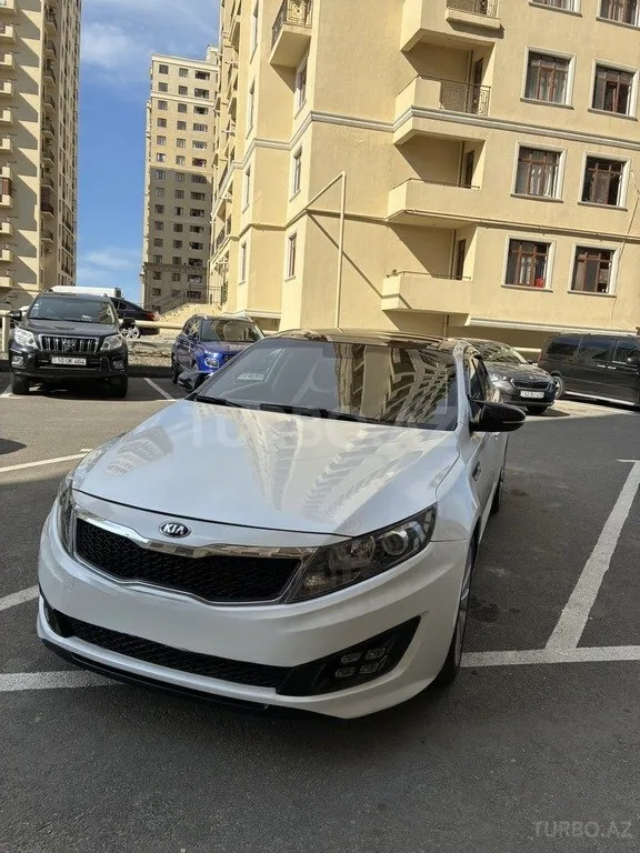 Kia Optima — фото 1/4