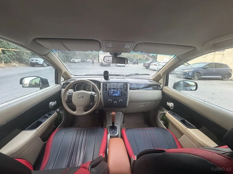 Nissan Tiida — foto 2/4