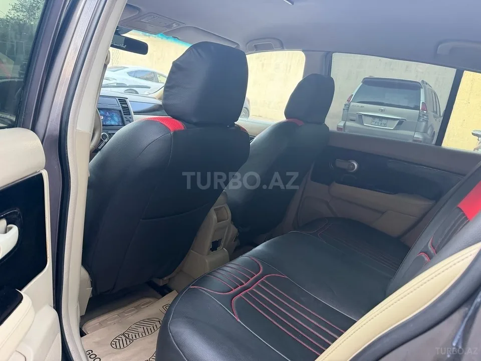 Nissan Tiida — foto 3/4