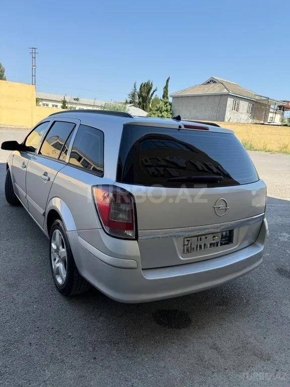 Opel Astra — фото 4/4