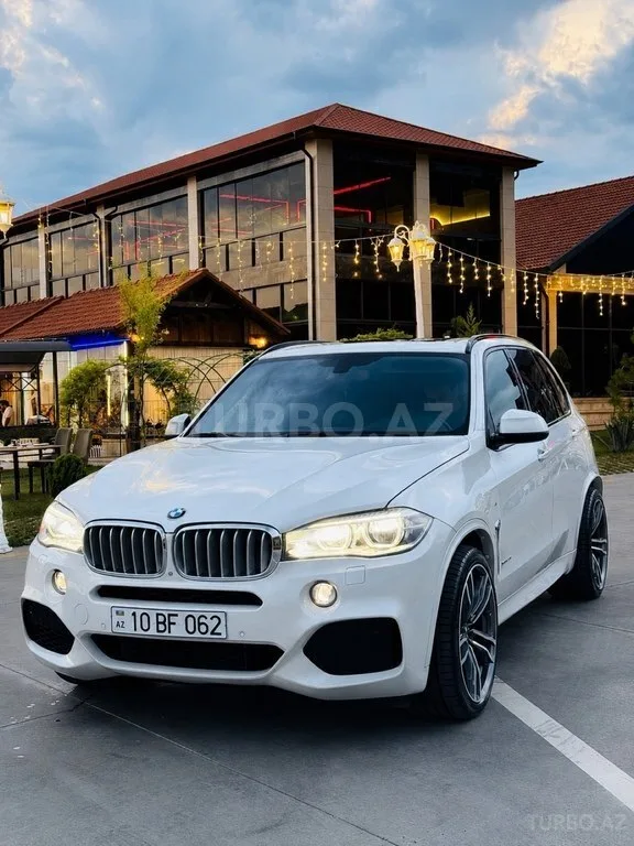 BMW X5 — фото 2/4