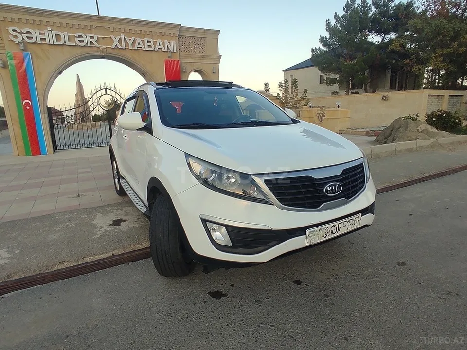 Kia Sportage — foto 4/4