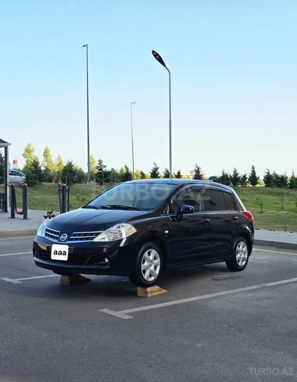 Nissan Tiida — фото 2/4