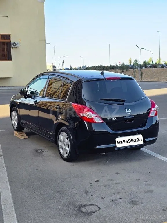 Nissan Tiida — фото 4/4