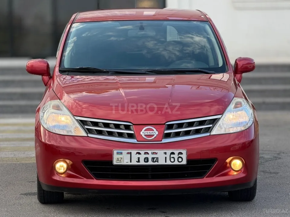 Nissan Tiida — фото 3/4