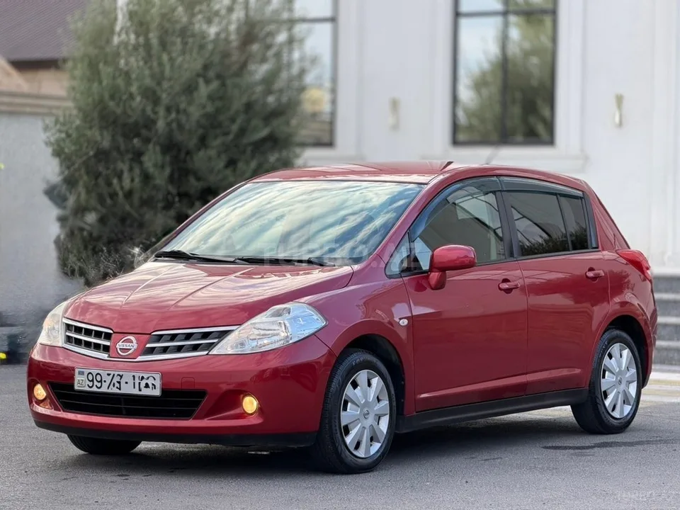 Nissan Tiida — фото 4/4
