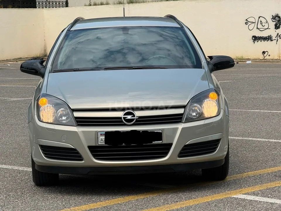 Opel Astra — фото 3/4