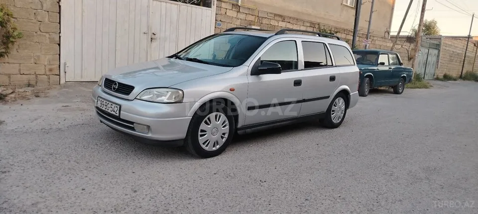 Opel Astra — фото 2/4