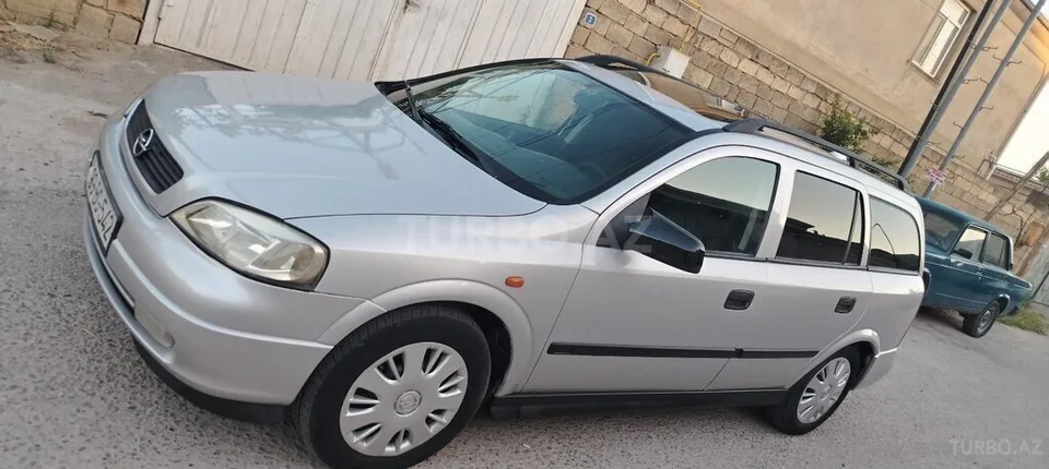 Opel Astra — фото 3/4