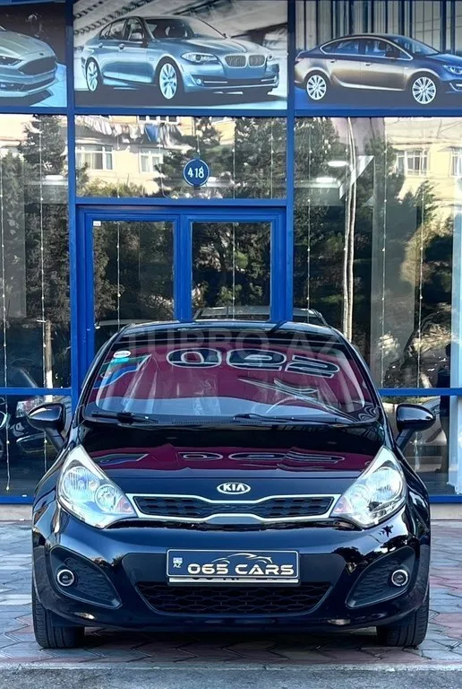 Kia Rio — фото 1/4