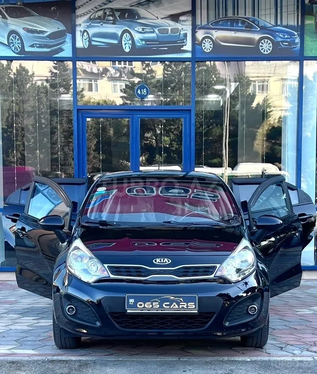 Kia Rio — фото 3/4