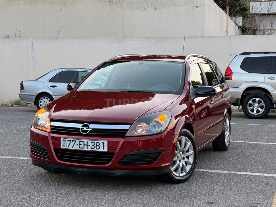 Opel Astra — фото 1/4