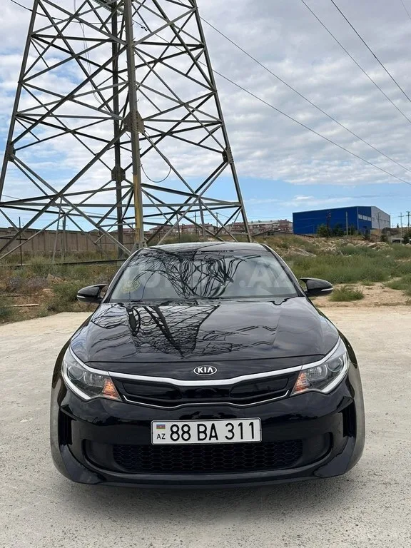 Kia Optima — фото 1/4