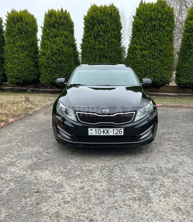 Kia Optima — фото 1/4