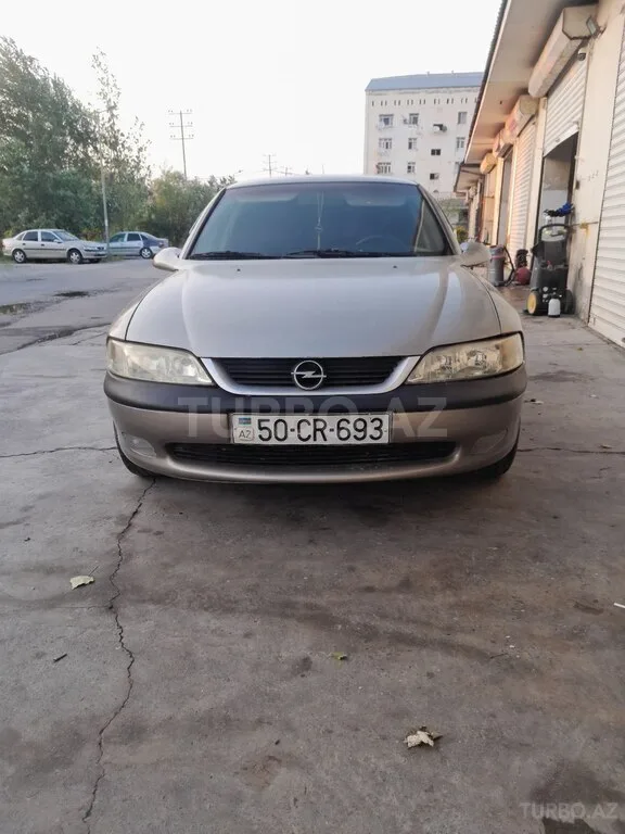 Opel Vectra — фото 1/4