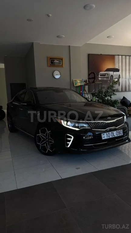 Kia Optima — фото 1/4