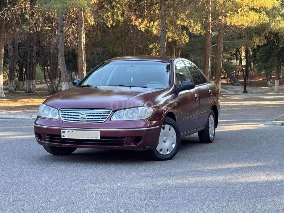 Nissan Sunny — фото 1/4