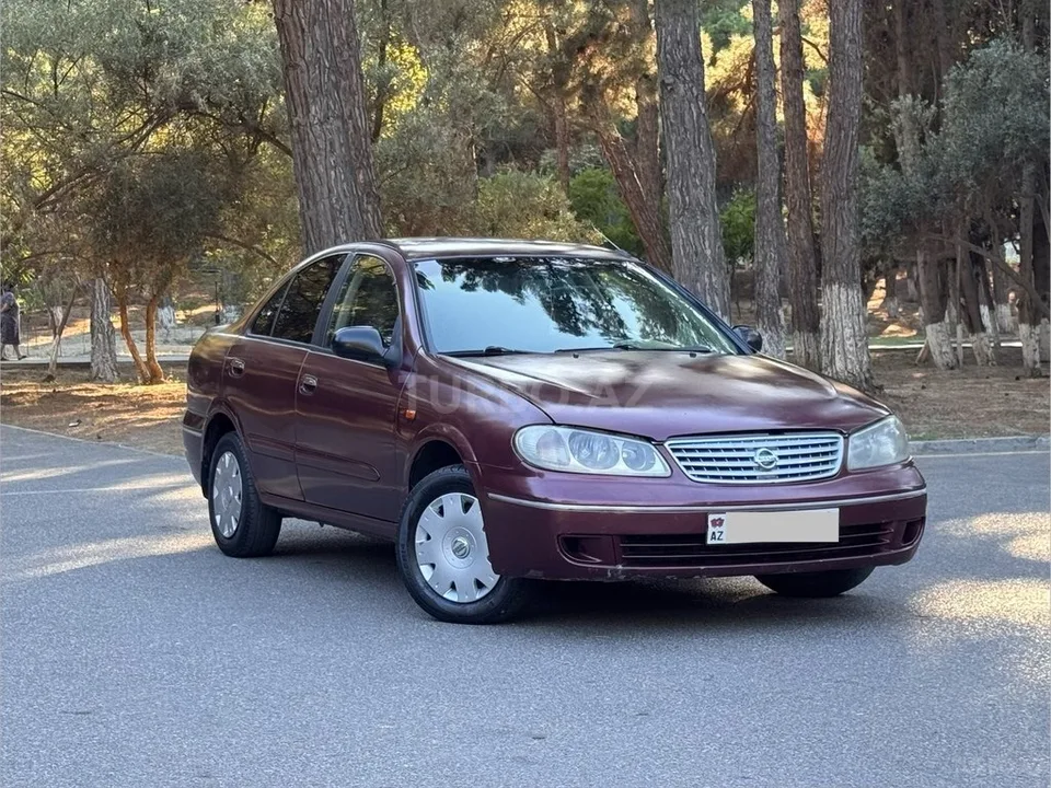Nissan Sunny — фото 3/4