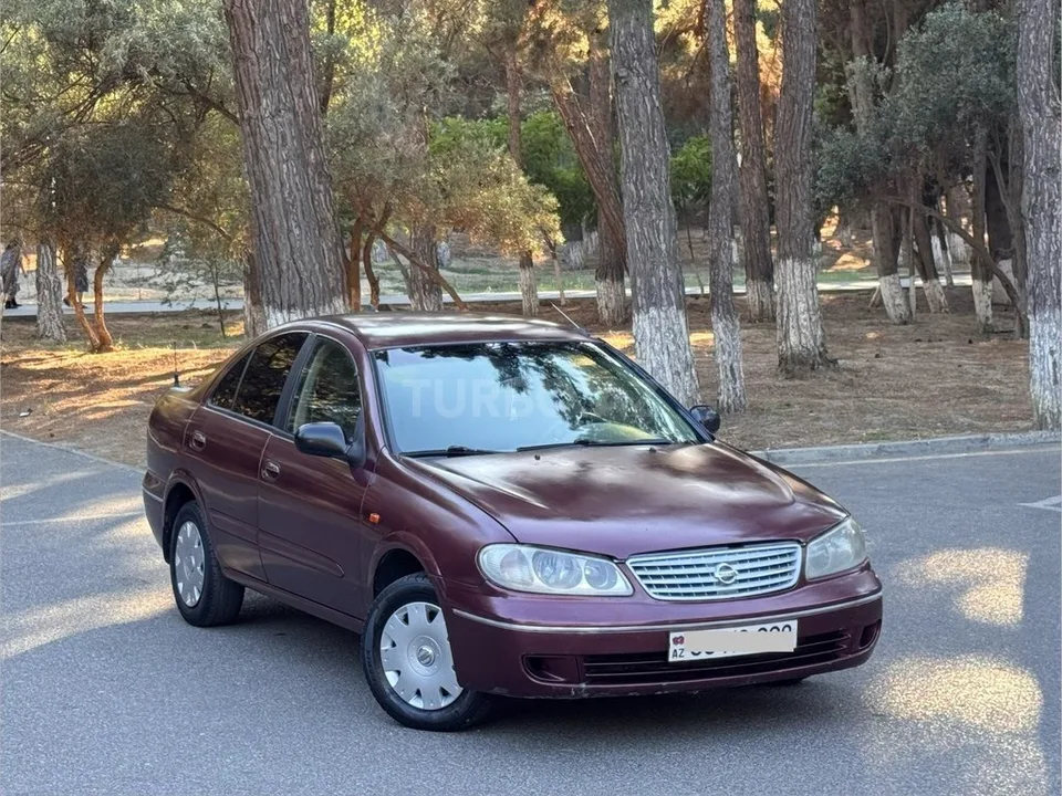 Nissan Sunny — фото 4/4