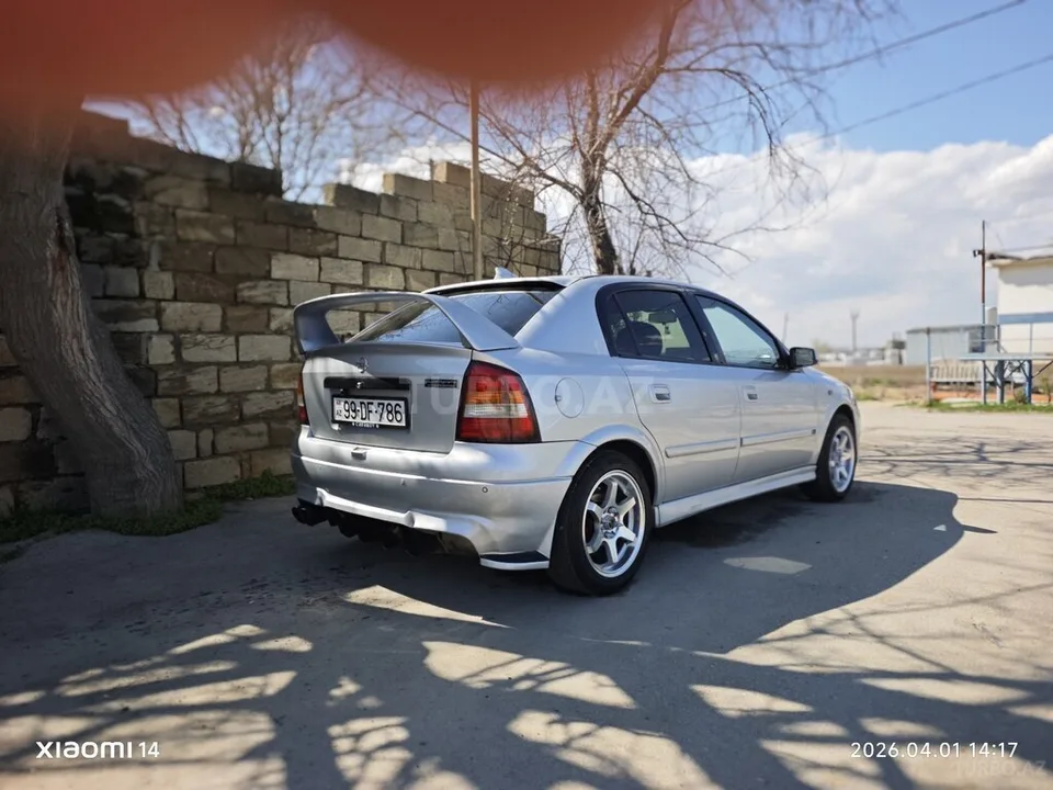 Opel Astra — фото 4/4