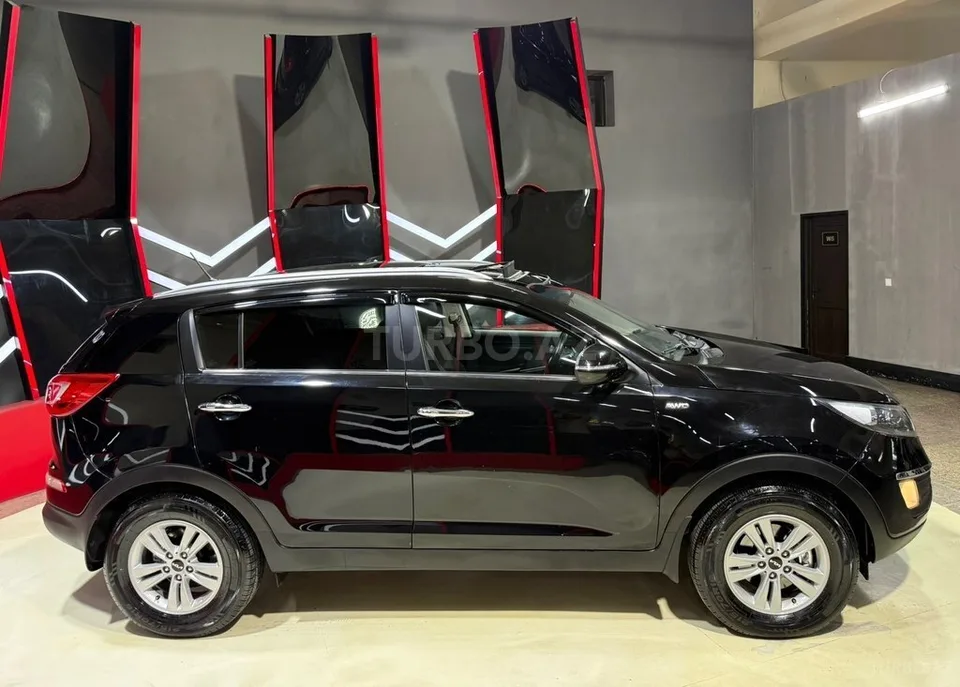 Kia Sportage — фото 4/4