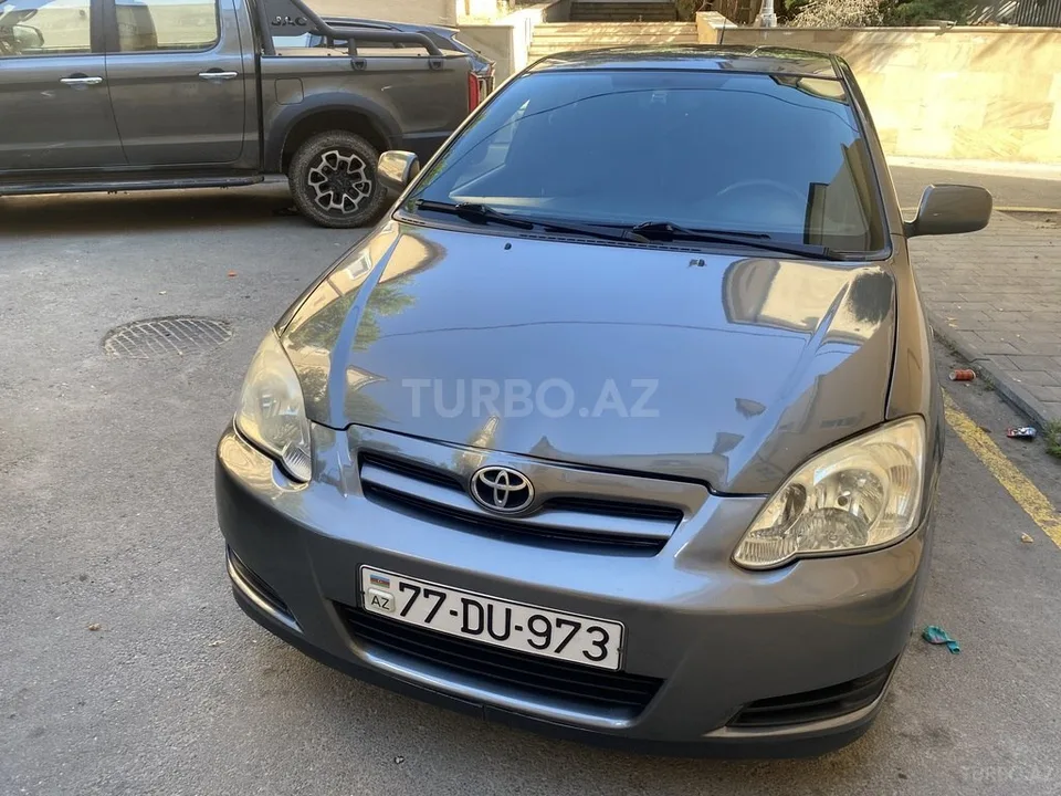 Toyota Corolla — foto 2/4