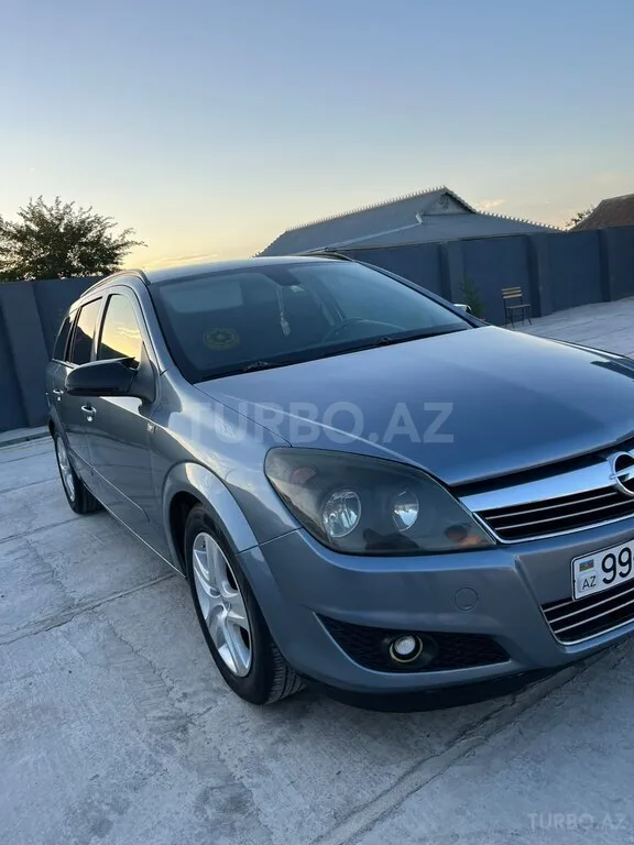 Opel Astra — фото 2/4