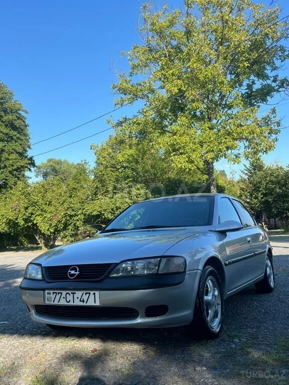 Opel Vectra — фото 1/4