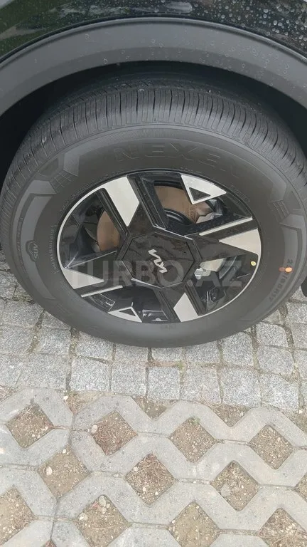 Kia Sportage — фото 2/4