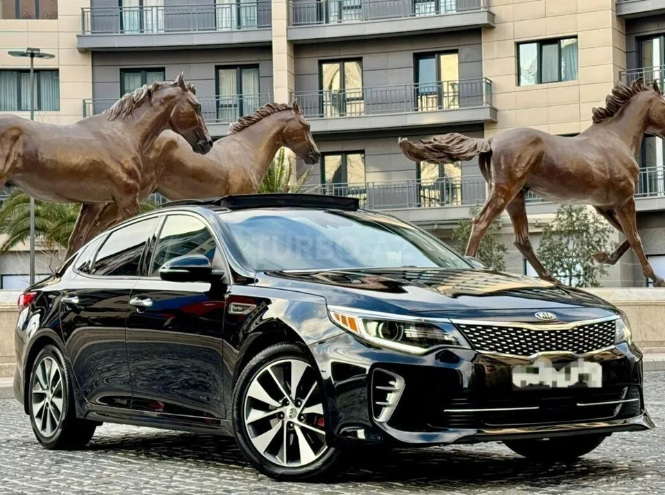 Kia Optima — фото 1/4