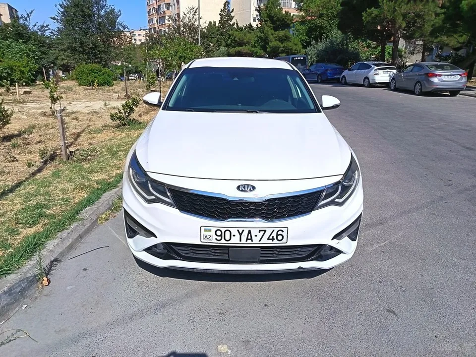 Kia Optima — фото 1/4
