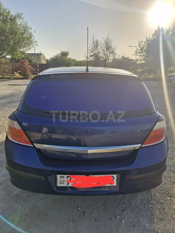 Opel Astra — фото 2/4