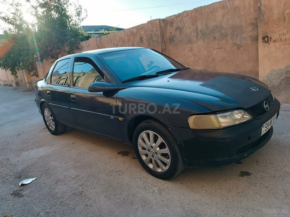 Opel Vectra — фото 1/4