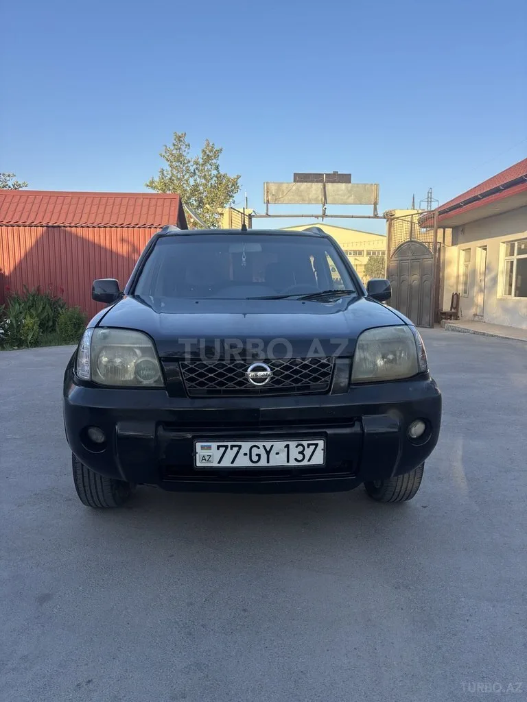 Nissan X-Trail — фото 1/4