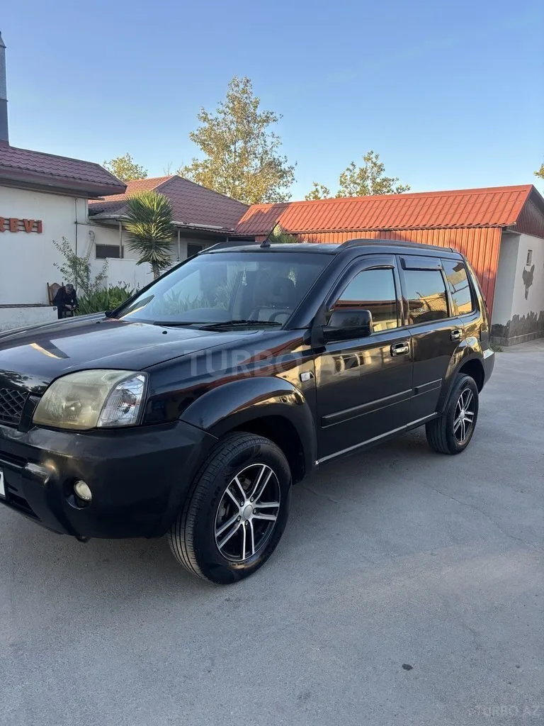 Nissan X-Trail — фото 2/4