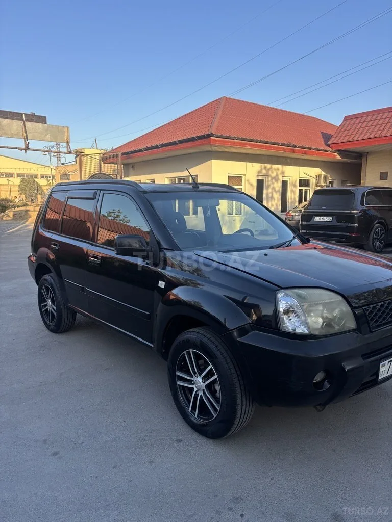Nissan X-Trail — фото 3/4