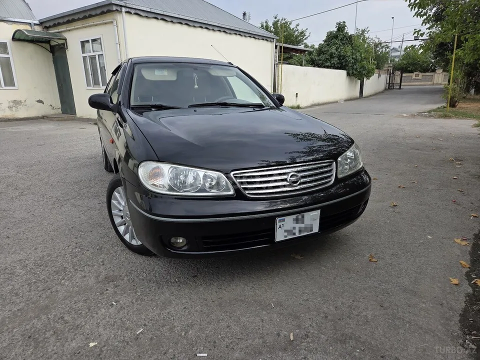 Nissan Sunny — фото 1/4