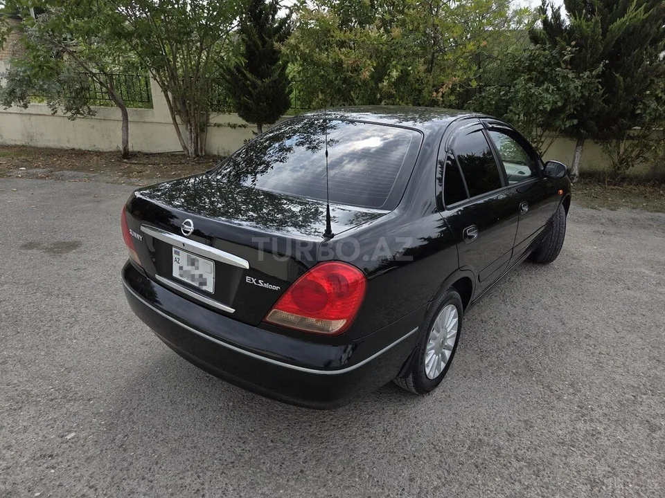 Nissan Sunny — фото 4/4