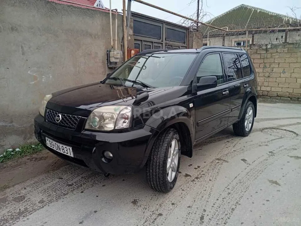 Nissan X-Trail — фото 1/4
