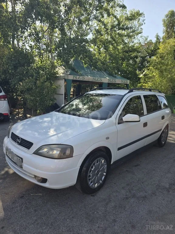 Opel Astra — фото 4/4