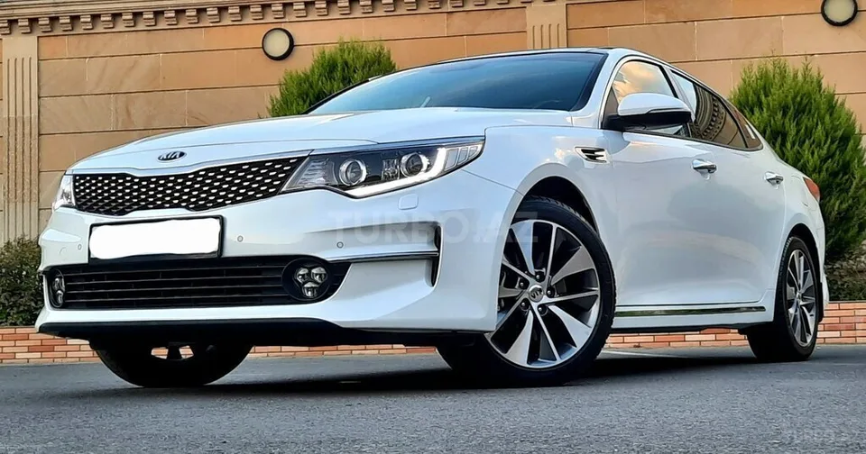 Kia Optima — фото 1/4