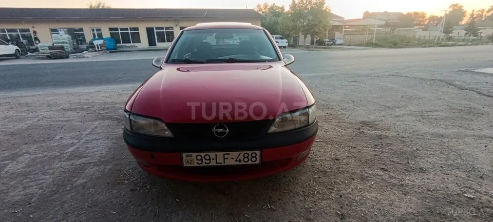Opel Vectra — фото 1/4