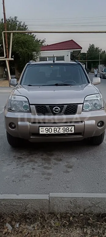 Nissan X-Trail — фото 1/4
