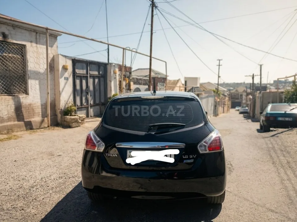 Nissan Tiida — фото 4/4