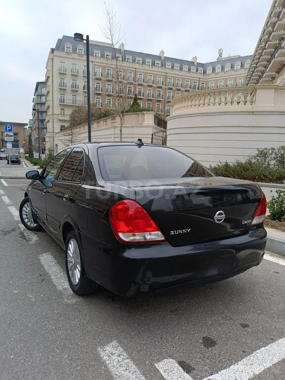 Nissan Sunny — фото 4/4