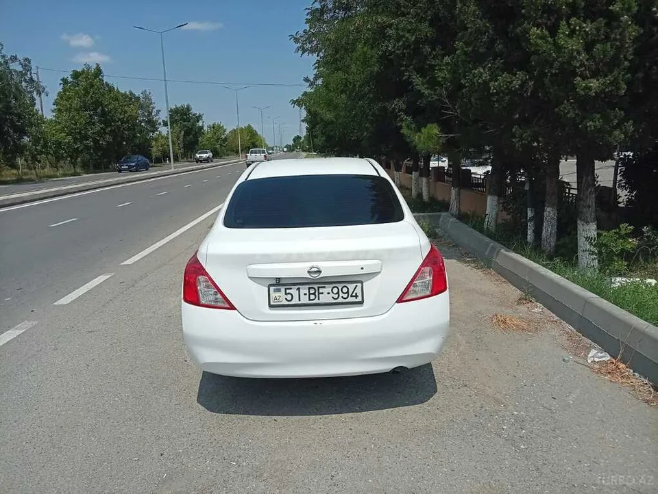 Nissan Sunny — фото 2/4